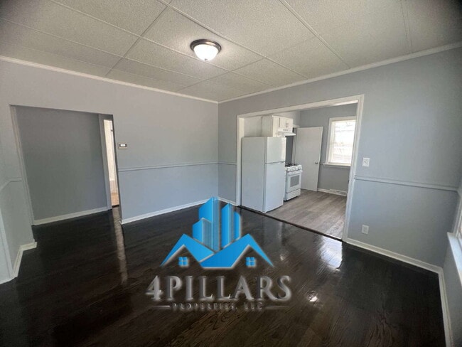 Building Photo - "Charming 3-Bed Home with Partially Finished Basement & Gleaming Hardwood Floors in Hammond - 226...