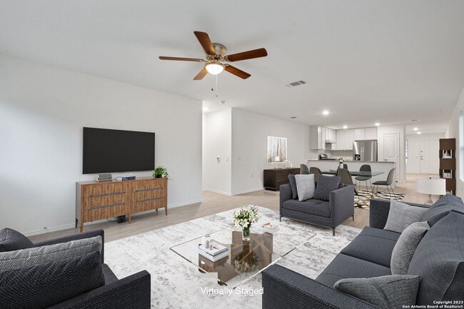 Building Photo - This beautiful single-story home has 4 bedrooms, 2 baths, vinyl flooring throughout, an open floo...