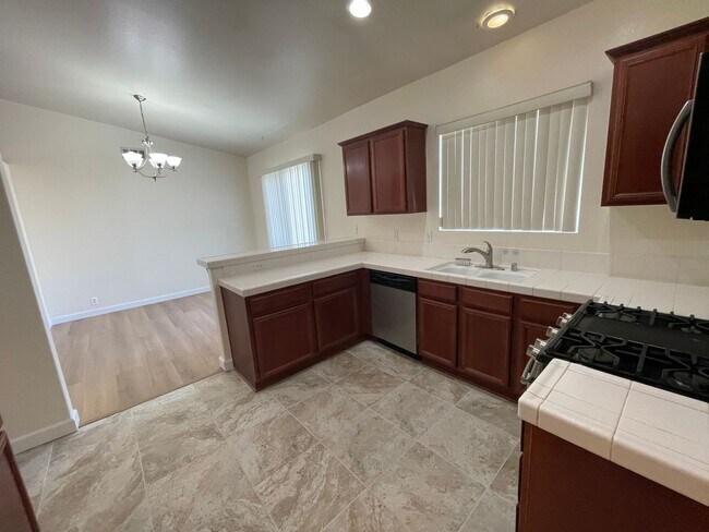 Building Photo - Apple Valley Home in The Vineyards- 3 Bedrooms, 2 Bathrooms, 2 Car Garage, New Flooring