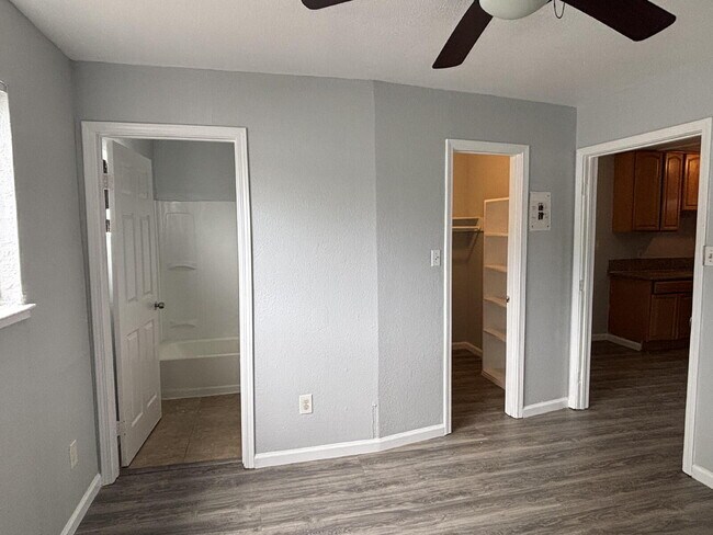 Building Photo - Corner & 1st Floor - Location, location, location! Become the newest neighbor at Palm Garden Apar...