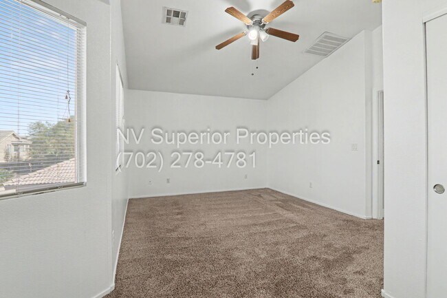 Building Photo - NW!! 4 bedrooms!! Bed & Bath DownStairs!!! RV Parking!!! Synthetic Grass Front yard!! Real Grass ...