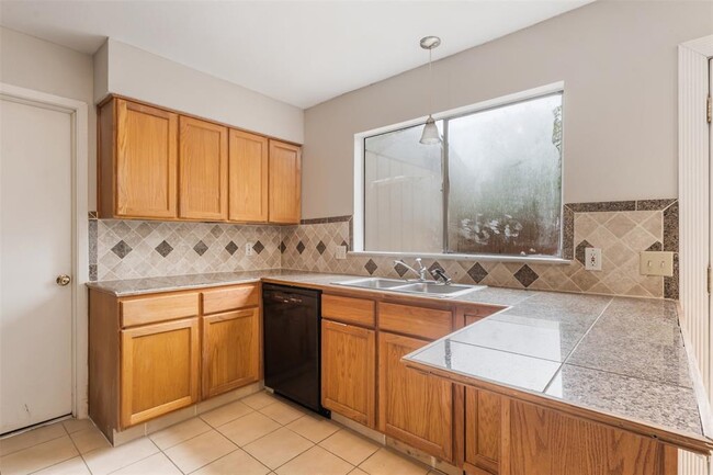 Building Photo - 9520 Quail Village Ln