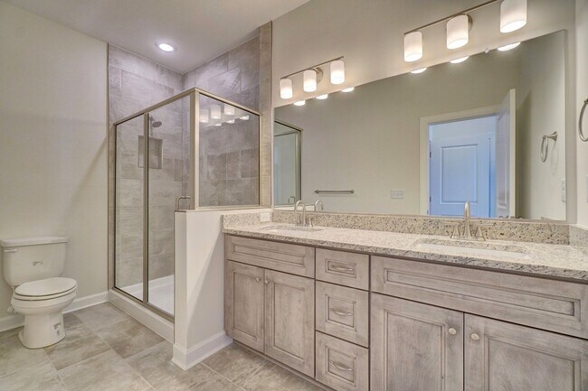 Building Photo - Available 08-05-25! Coastal Luxury Townhom...