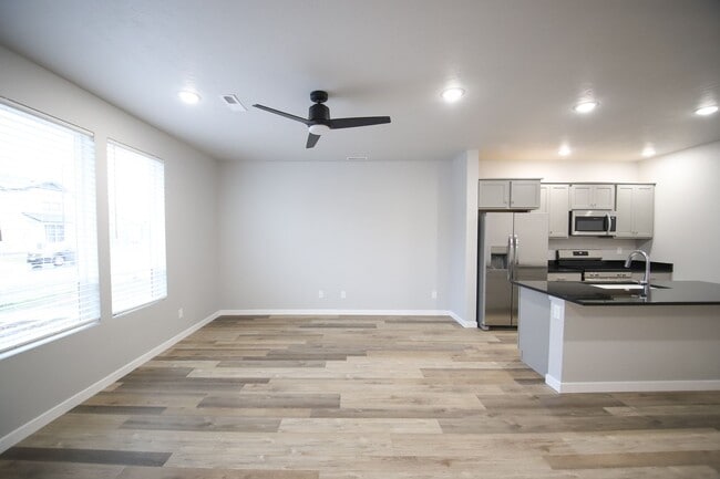 Building Photo - Baraya Townhomes: Modern Townhomes for Ren...