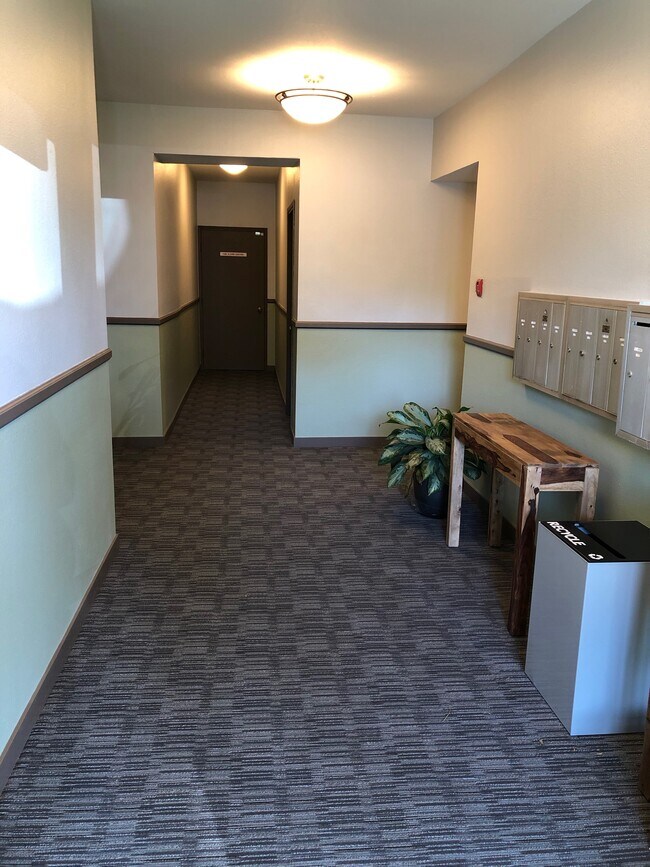 Newly remodeled welcoming lobby with elevator - 300 NW 80th St