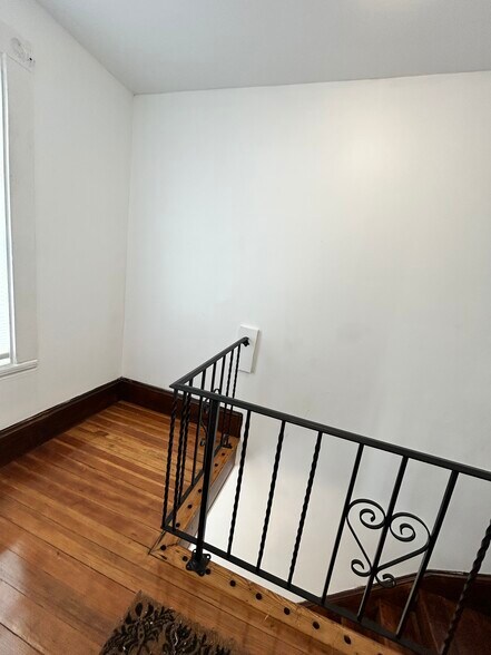 Front hall landing - 83 1/2 Summer St