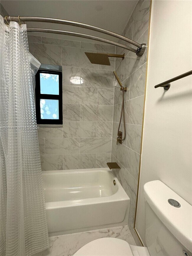 Building Photo - 5530 NW Miami Ct