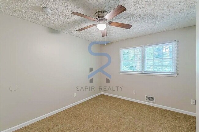 Building Photo - LIMITED-TIME OFFER!  Apply today with NO APPLICATION FEE! Terms apply. Call (678) 487-7896, Optio...