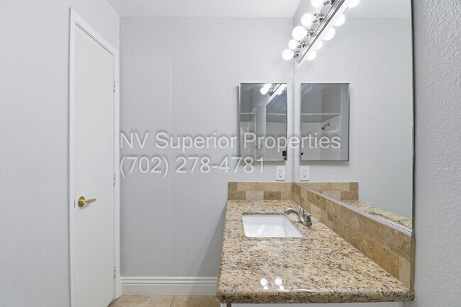 Building Photo - SW!!! 2 Bedroom Condo 1st Floor!! 2 Garage!! Gated!! Community Pool!! Fitness Room!! 2 Primary Be...