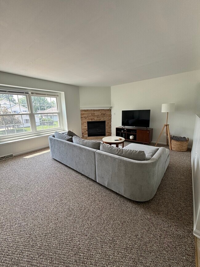 Expansive living room with cozy fireplace - 2218 Patrick Ln