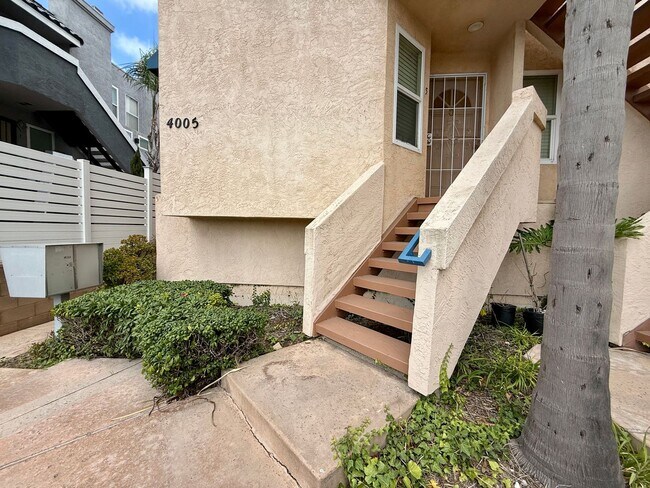 Building Photo - Spacious 2 BED 2 BATH Condo! Two-Car Tandem Garage! Central AC! In Unit Washer/Dryer!