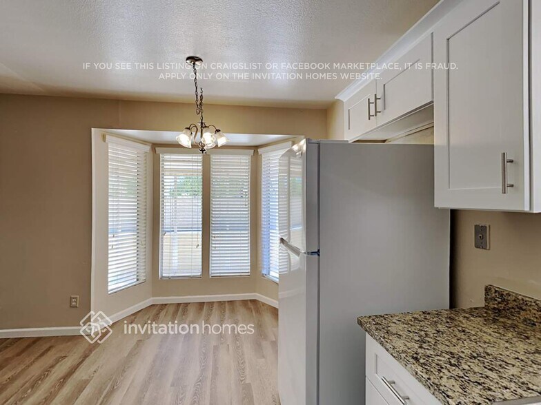 Building Photo - 9023 W Harmont Dr