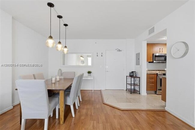 Building Photo - 10275 Collins Ave
