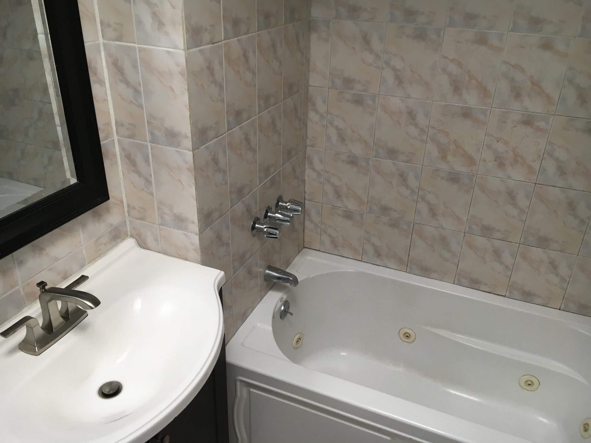 Tile bathroom with skylight - 601 N Park Ave