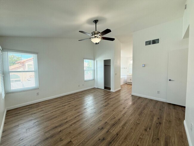 Building Photo - Corner Lot Beauty with Open Living, Guest Suite Down & Expansive Backyard