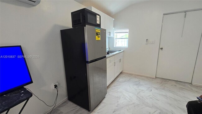 Building Photo - 2440 NW 99th St