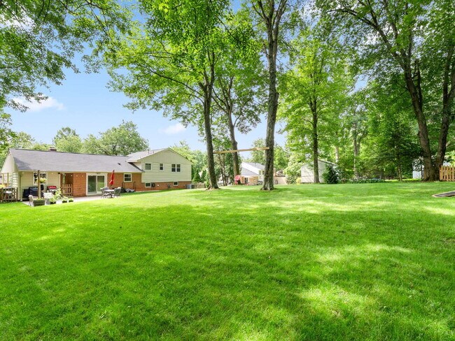 Building Photo - Beautifully Updated Home with Finished Lower Level, Fenced Yard & Exceptional Outdoor Living