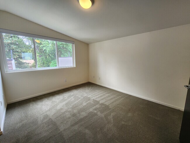 Main bedroom with lots of natural lighting - 2118 NE 89th St
