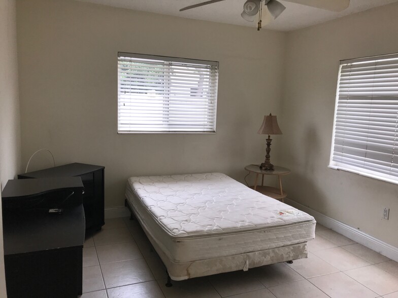 2nd bedroom with queen bed set - 265 SW 7th St