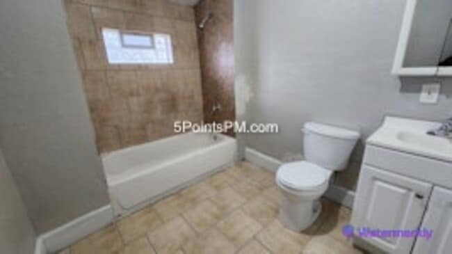 Building Photo - 9804 Miles Ave