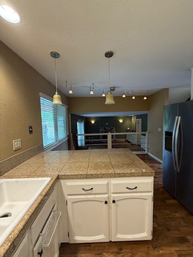 Building Photo - OPEN HOUSE this Wednesday 5pm-6:30pm - Private Redwood Setting | 4BR Home with Family Room, Bar &...