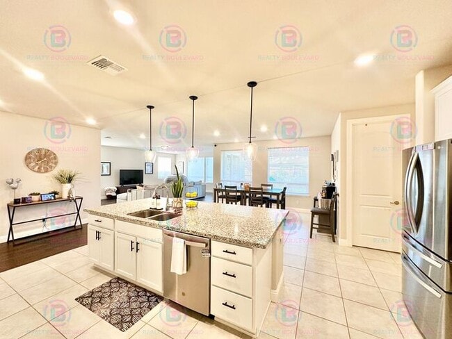 Building Photo - Welcome to your dream home, where modern elegance meets unparalleled convenience!