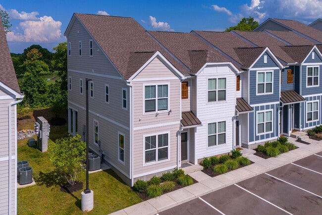 Building Photo - Brand new, Low-maintenance living!