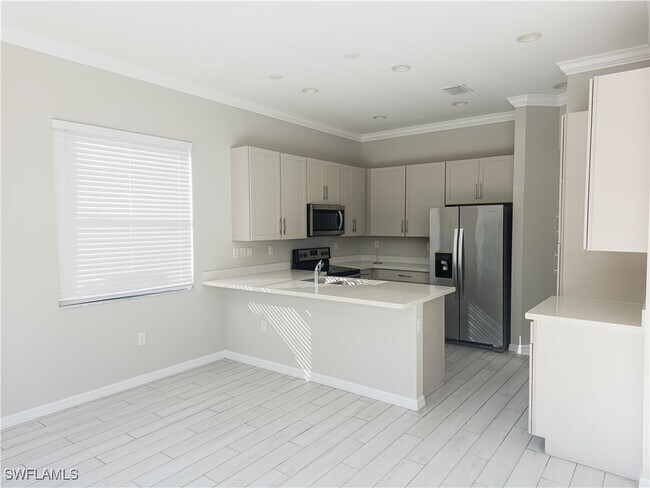 Building Photo - 8923 Madrid Cir