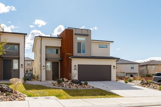 Building Photo - 4 bed | 2 1/2 bath | 2 car garage in Desert Canyon with washer/dryer/fridge