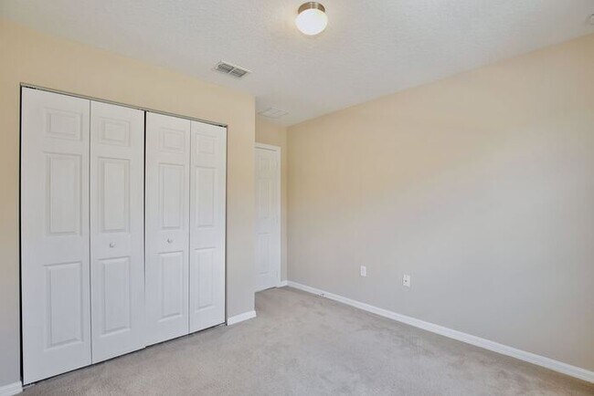 Building Photo - Spacious 3/2.5 End-Unit with Breathtaking Lake Views in Sanford!