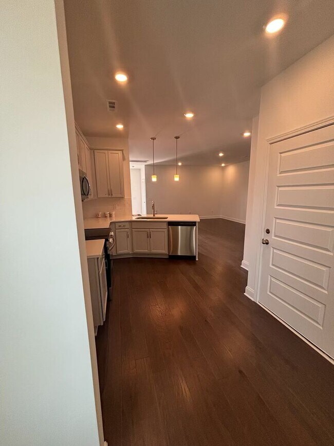 Building Photo - **BE THE LUCKY ONE TO LIVE IN THIS 2024-BUILT END-UNIT TOWNHOME IN A RESORT-STYLE COMMUNITY**