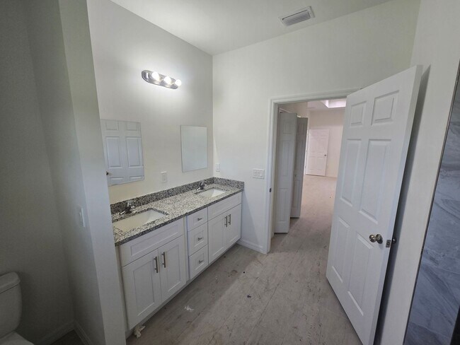 Building Photo - BRAND NEW CONSTRUCTION-LARGE CUSTOM 3/2/2 ...