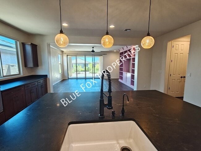 Building Photo - 8454 N Lone Ranger Rd