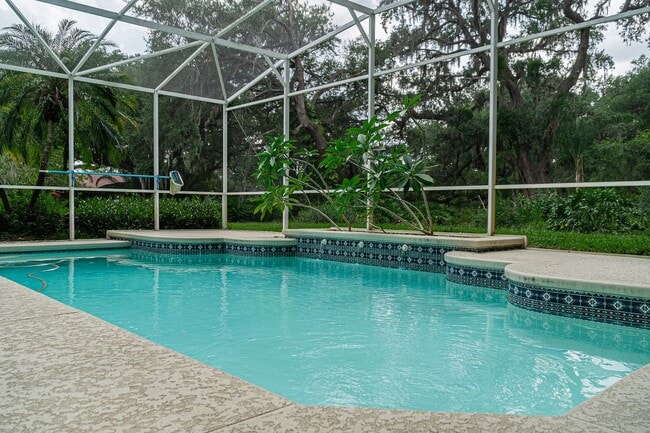 Building Photo - Beautiful 3/3 Pool Home in Gated Community W/ Lake Access