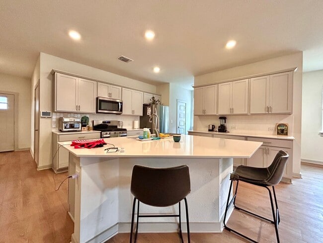 Building Photo - Light-Filled 4 Bedroom, 2 Bath Home with Deck & Fenced Backyard