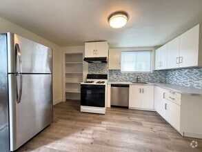 Building Photo - Updated 2BR Apartment with office now show...