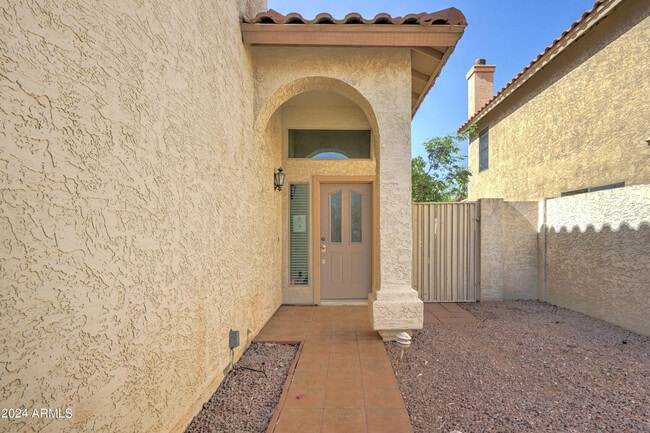 Building Photo - 8804 E Charter Oak Dr