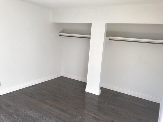 Newly White painted room with hard wood floors - 101 Old Ferry Rd