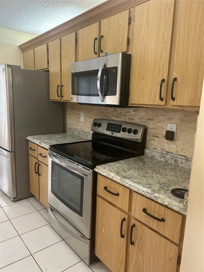 Building Photo - 9321 SW 23rd St