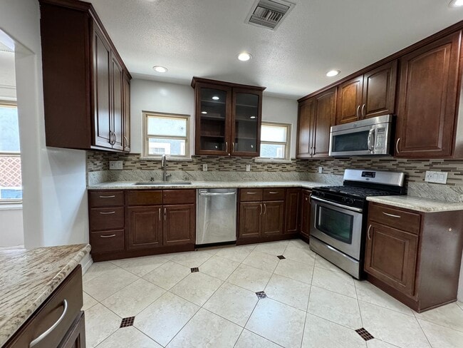 Building Photo - Charming Spanish-Style Home with a lot of ...