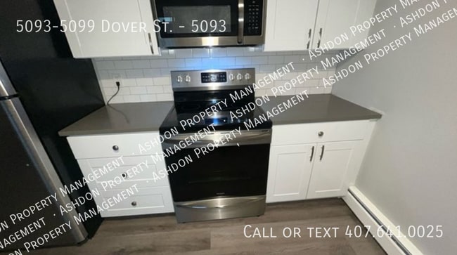 Building Photo - 5093-5099 Dover St.-5093