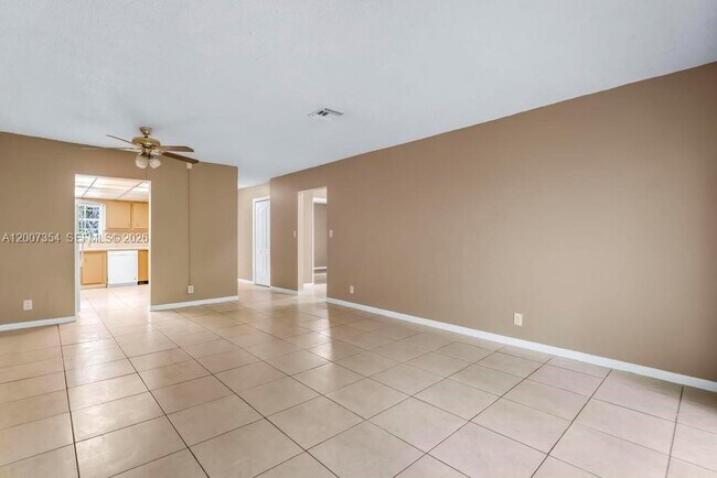 Building Photo - 3100 Coral Springs Dr