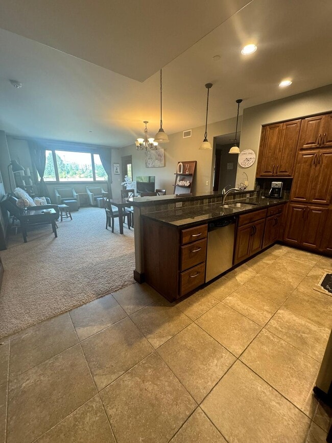 Building Photo - River Stone Condominium