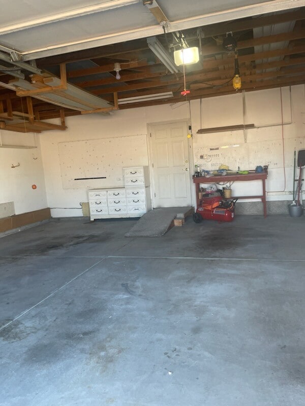 Oversized two car garage offers space for parking AND storage - 240 W Kyle Dr