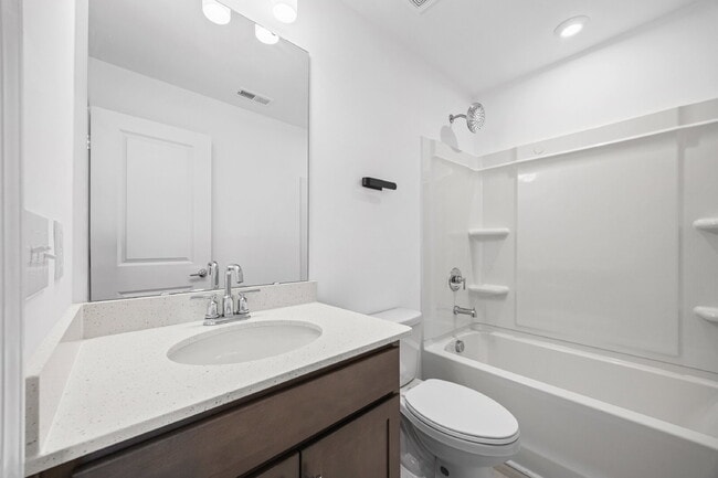 Building Photo - Spacious 3BR Townhome with Garage, Open Layout & Community Pool – Move-In Ready!