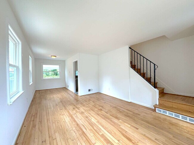 Building Photo - Charming 2BR Townhome with Finished Basement, Fenced Yard & Private Driveway Near Huntington Metro