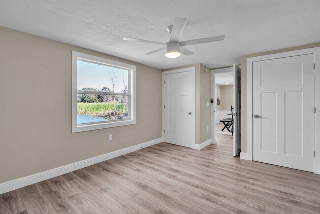 Building Photo - A spacious 3-bedroom, 2-bath layout provides plenty of room for family and guests!
