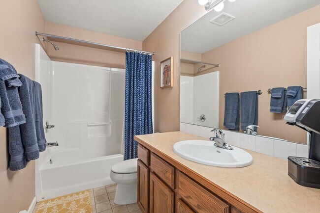Building Photo - Prime Location | Spacious 4BD Home with El...
