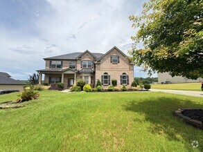 Building Photo - Beautiful 5 Bedroom Home with Massive Walk...