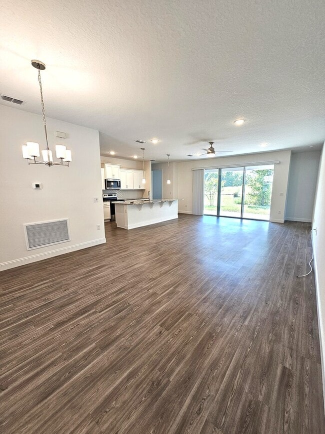 Building Photo - *****STUNNING 4/2 HOME IN PALM COAST 3 CAR GARAGE!